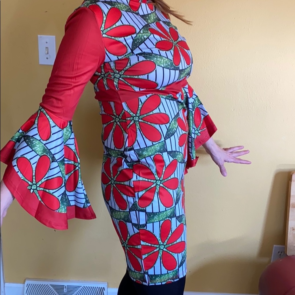 NEW. Red and white daisy chain dress.